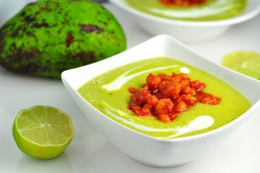 Cold avocado soup with spicy shrimp