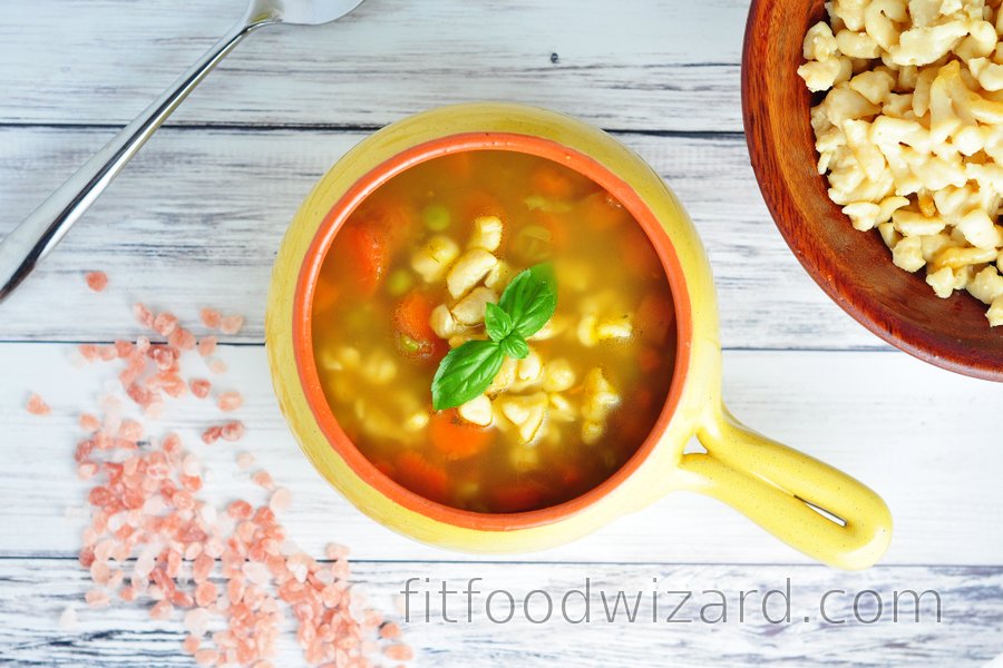 Healthy soup with carrot, peas and chickpea gnocchi