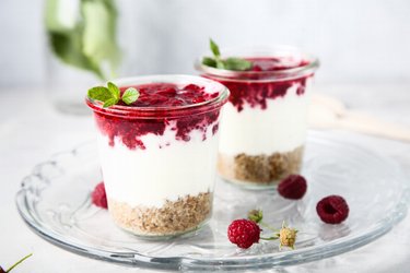 Healthy raspberry cheesecake in a jar