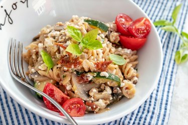 Pasta with cottage cheese and stewed vegetables